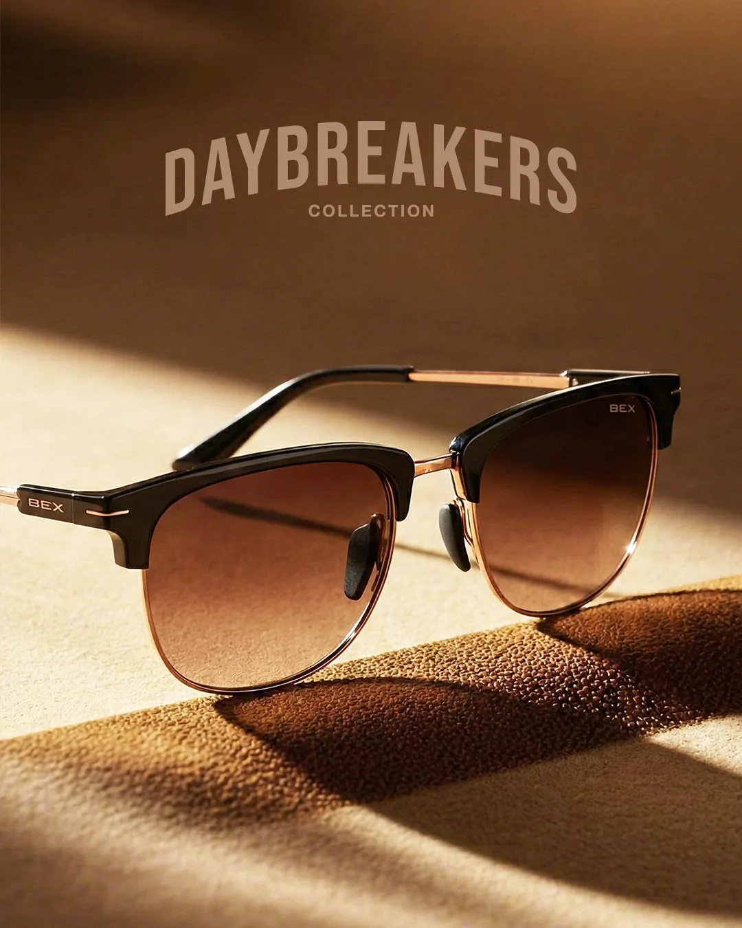 Daybreakers Collection advertisement showing a black and rose gold frame in raking sunlight
