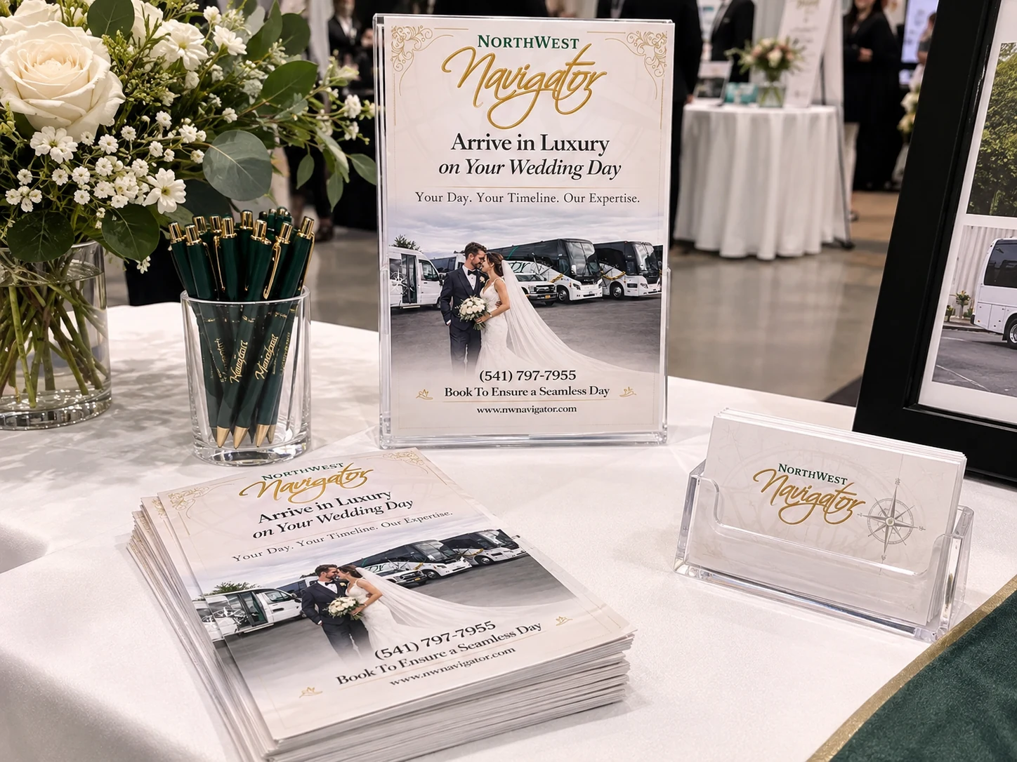 Display mockup of Northwest Navigator wedding flyers, a tabletop sign and business cards